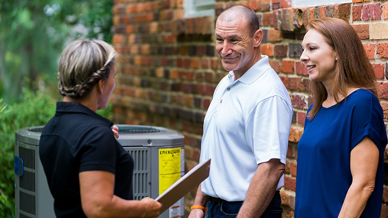 Tech Preparing For Heating Service